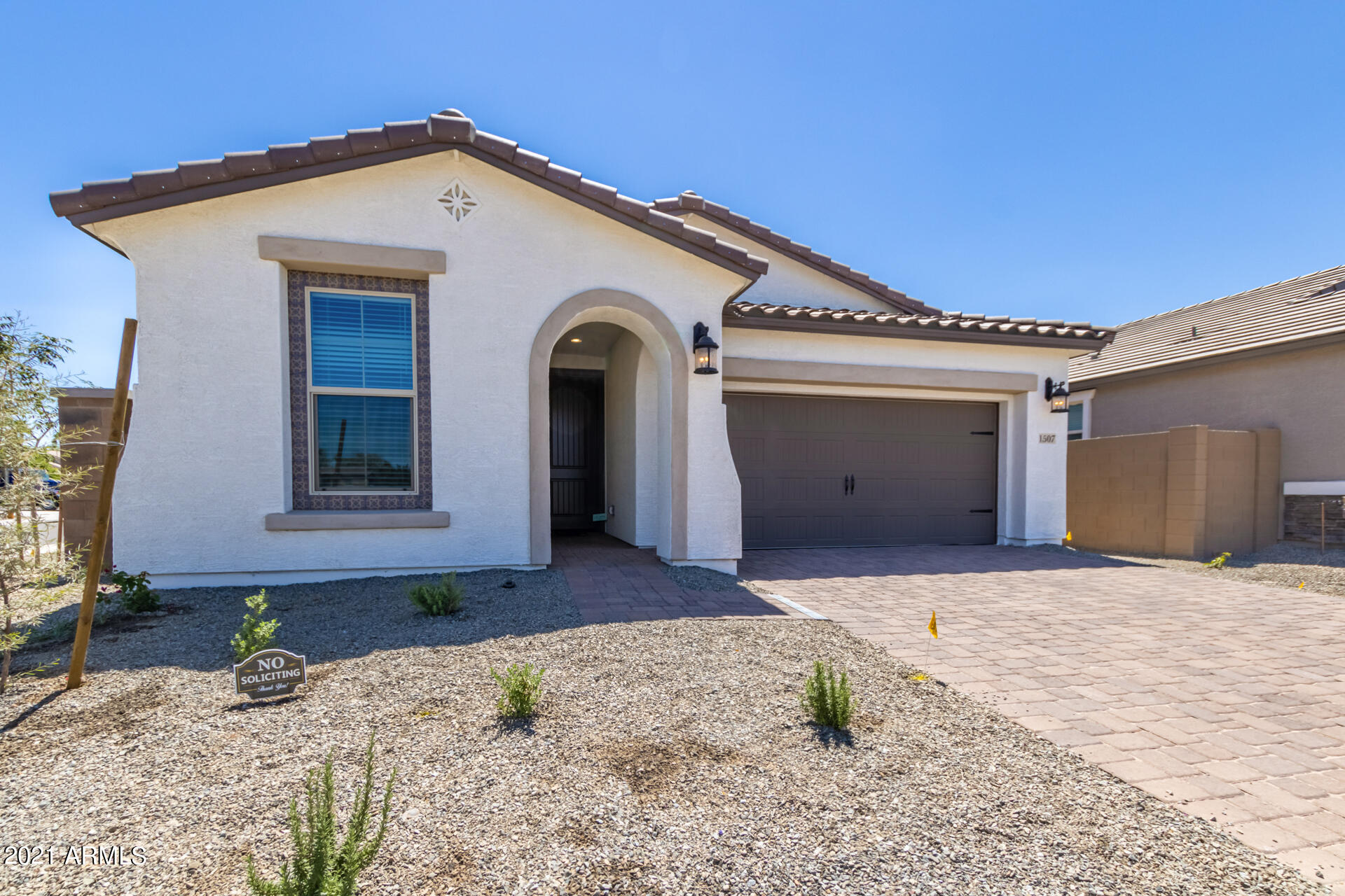 1507 South Honeysuckle Lane Gilbert, AZ 85296 - Photo 2 of 32 a front view of a house with trees