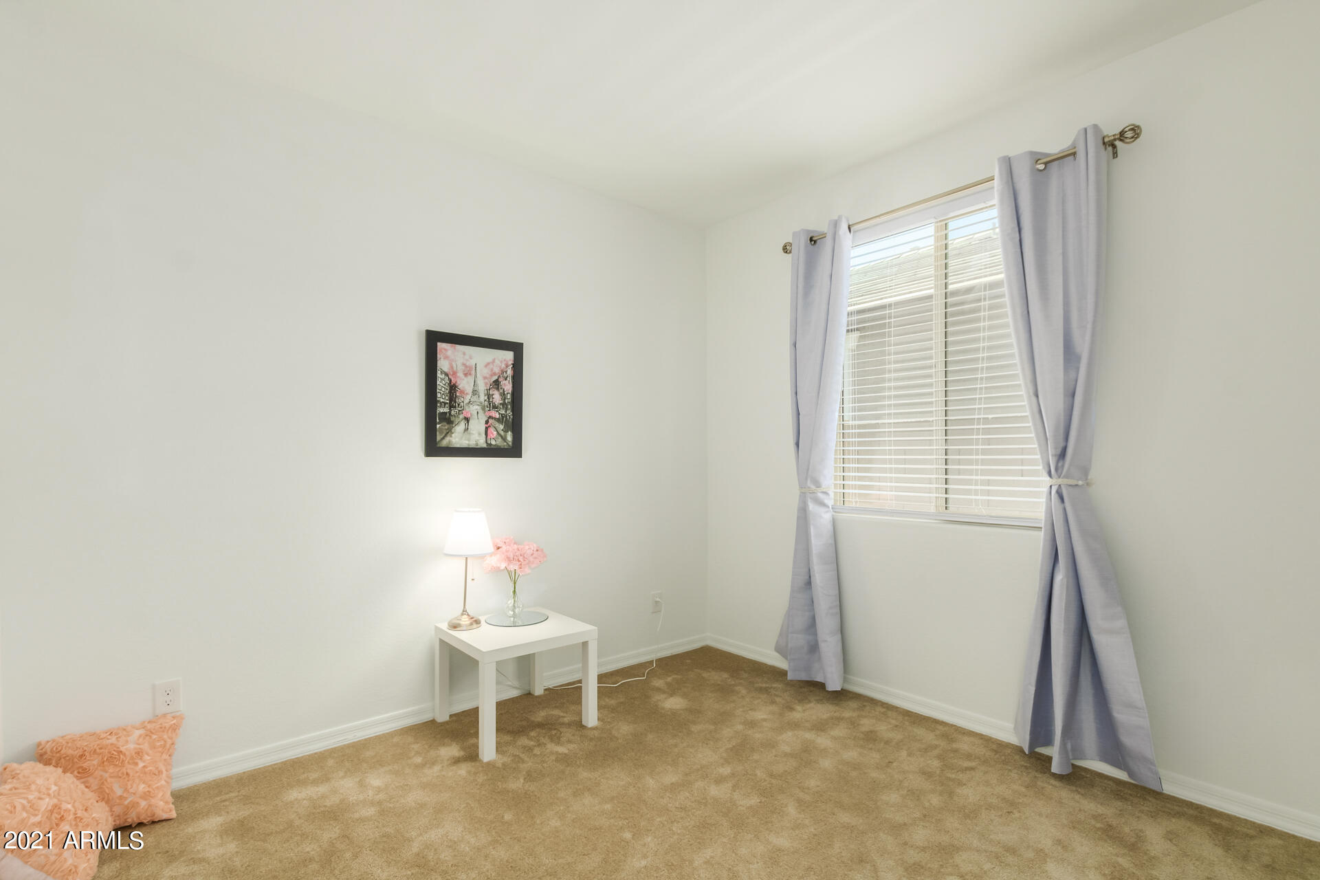 1507 South Honeysuckle Lane Gilbert, AZ 85296 - Photo 25 of 32 a living room with furniture and a window