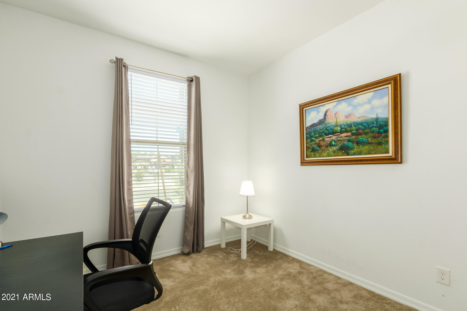 1507 South Honeysuckle Lane Gilbert, AZ 85296 - Photo 26 of 32 a view of a workspace with furniture and a window
