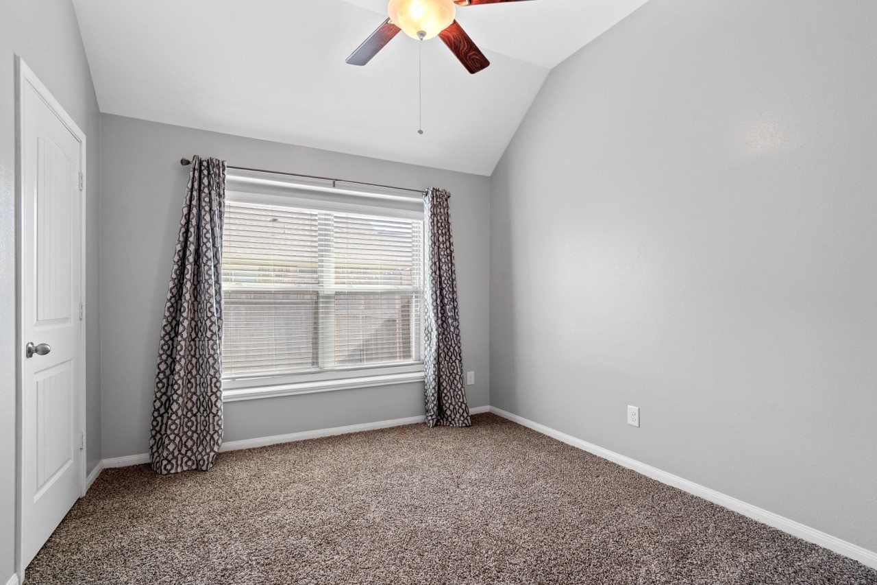 12126 Walden Road Montgomery, TX 77356 - Photo 15 of 50 Bedroom #1 sits at the front right side of the home. Carpet is still in good condition.