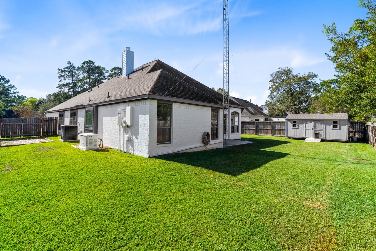 12126 Walden Road Montgomery, TX 77356 - Photo 39 of 50 New main electrical panel updated and labeled. Newly serviced AC with added hard start kit. AC also has added bacterial lights which kills most bacteria circulating in the air within the home. All AC vents have been professionally cleaned with a blue light. Attic has dual power vents fans.