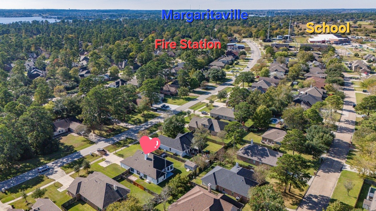12126 Walden Road Montgomery, TX 77356 - Photo 43 of 50 Looking at the home from the backyard to the front main road. Notice to the right of the home is the fire station on the left and across from it is the elementary school. Further off in the distance is Margaritaville.