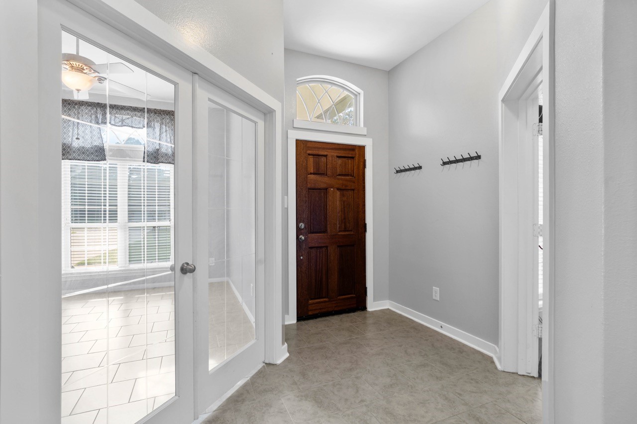 12126 Walden Road Montgomery, TX 77356 - Photo 5 of 50 Entryway looking to both offices on the left and right. Both are located in the front of the home and overlook the front yard. This home also comes with a 4-camera security system with a DVR.