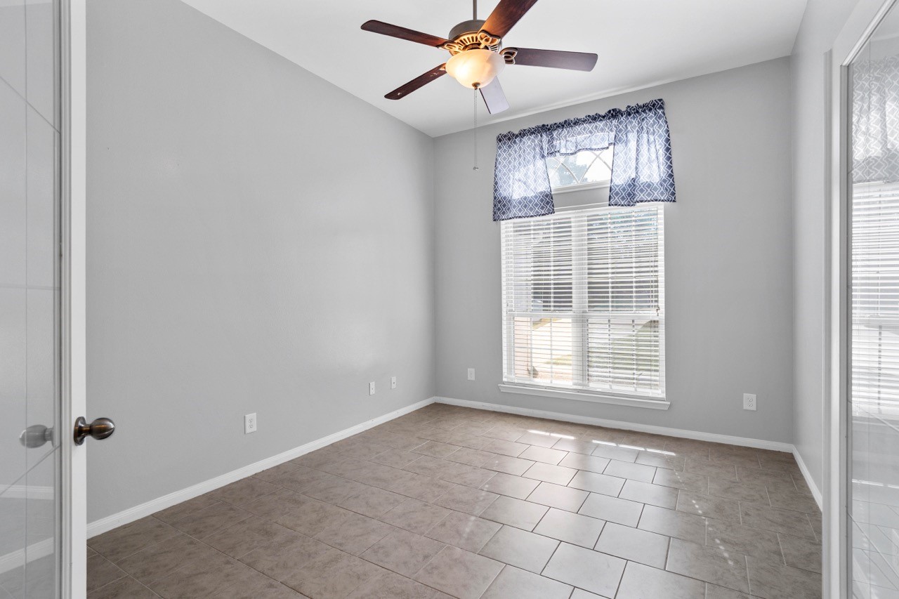 12126 Walden Road Montgomery, TX 77356 - Photo 6 of 50 View of bedroom #3/office that overlooks the front yard and driveway.