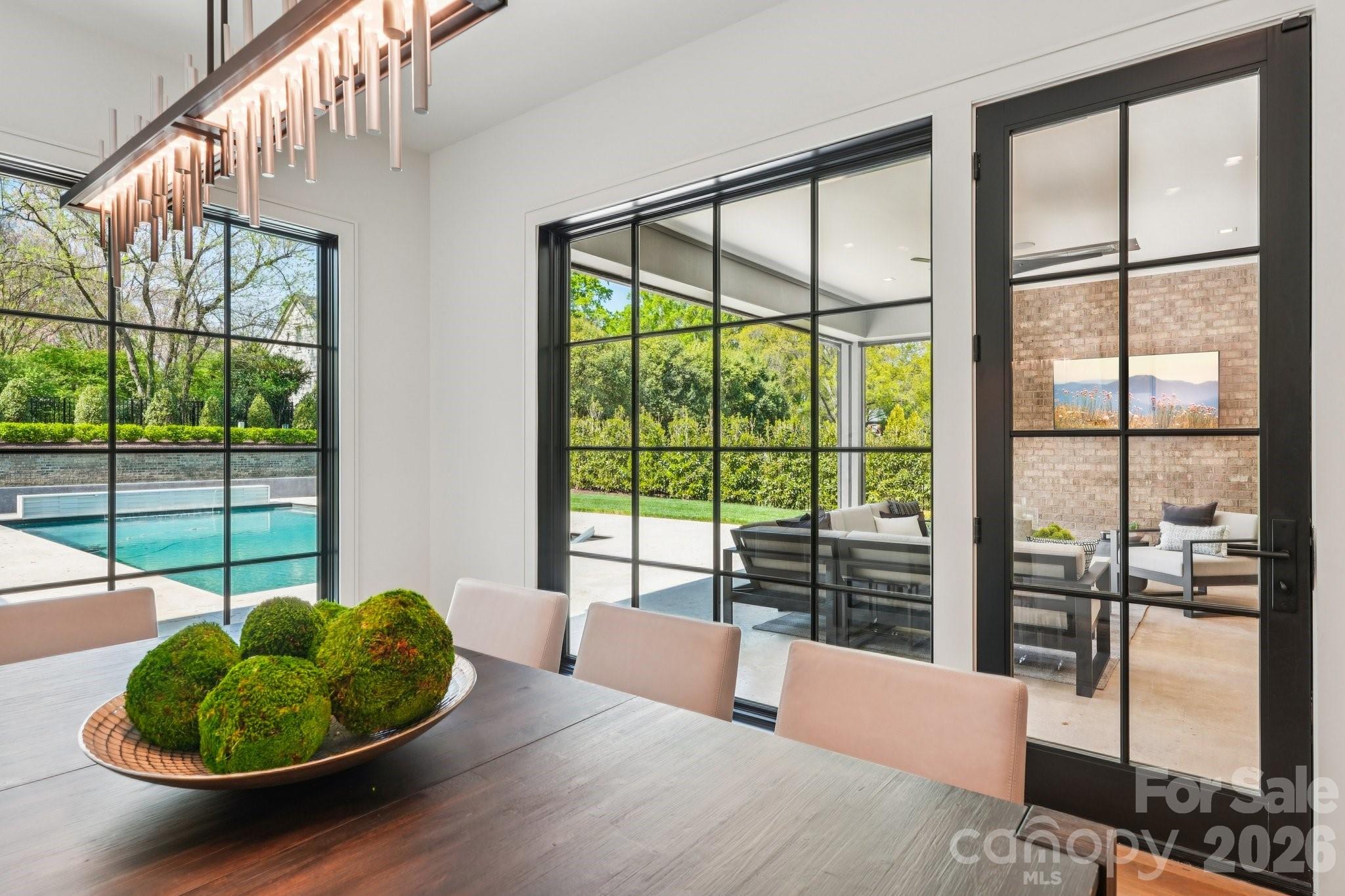 2103 Cortelyou Road Charlotte, NC 28211 - Photo 14 of 45 a bedroom with furniture and a large window