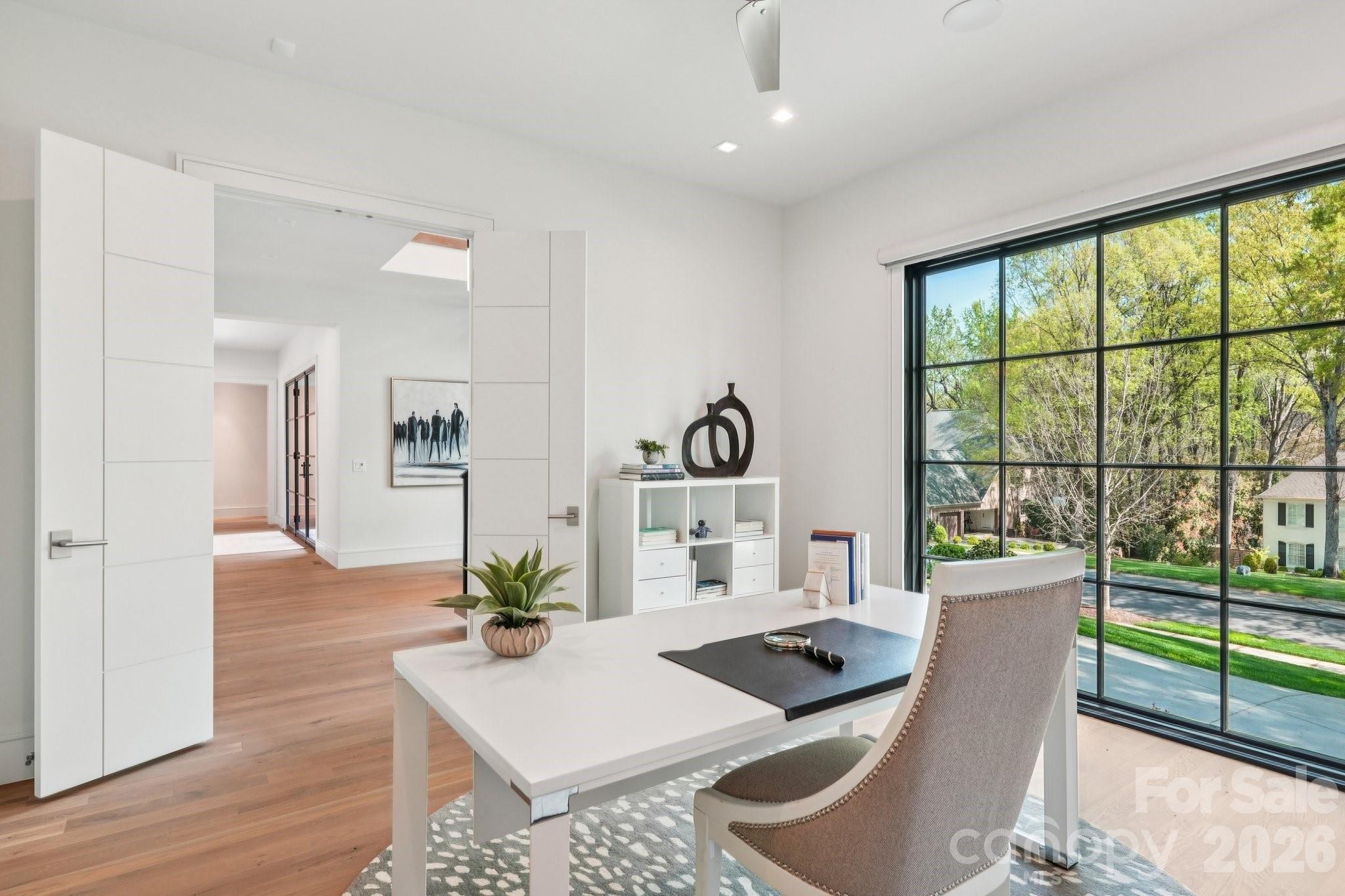 2103 Cortelyou Road Charlotte, NC 28211 - Photo 15 of 45 a living room with furniture and a large window