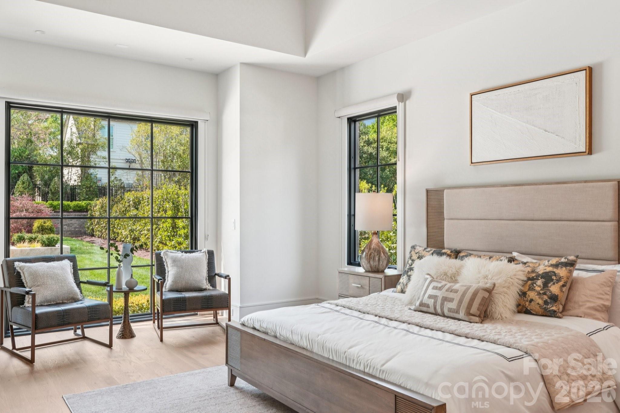 2103 Cortelyou Road Charlotte, NC 28211 - Photo 16 of 45 a bedroom with a bed and a large window