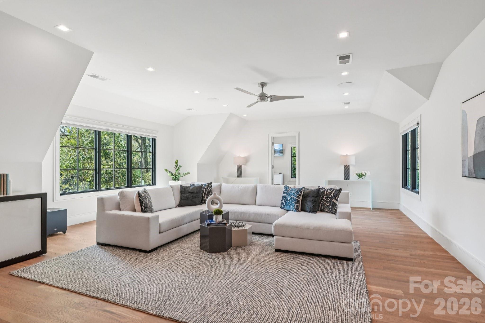 2103 Cortelyou Road Charlotte, NC 28211 - Photo 34 of 45 a living room with furniture and a large window