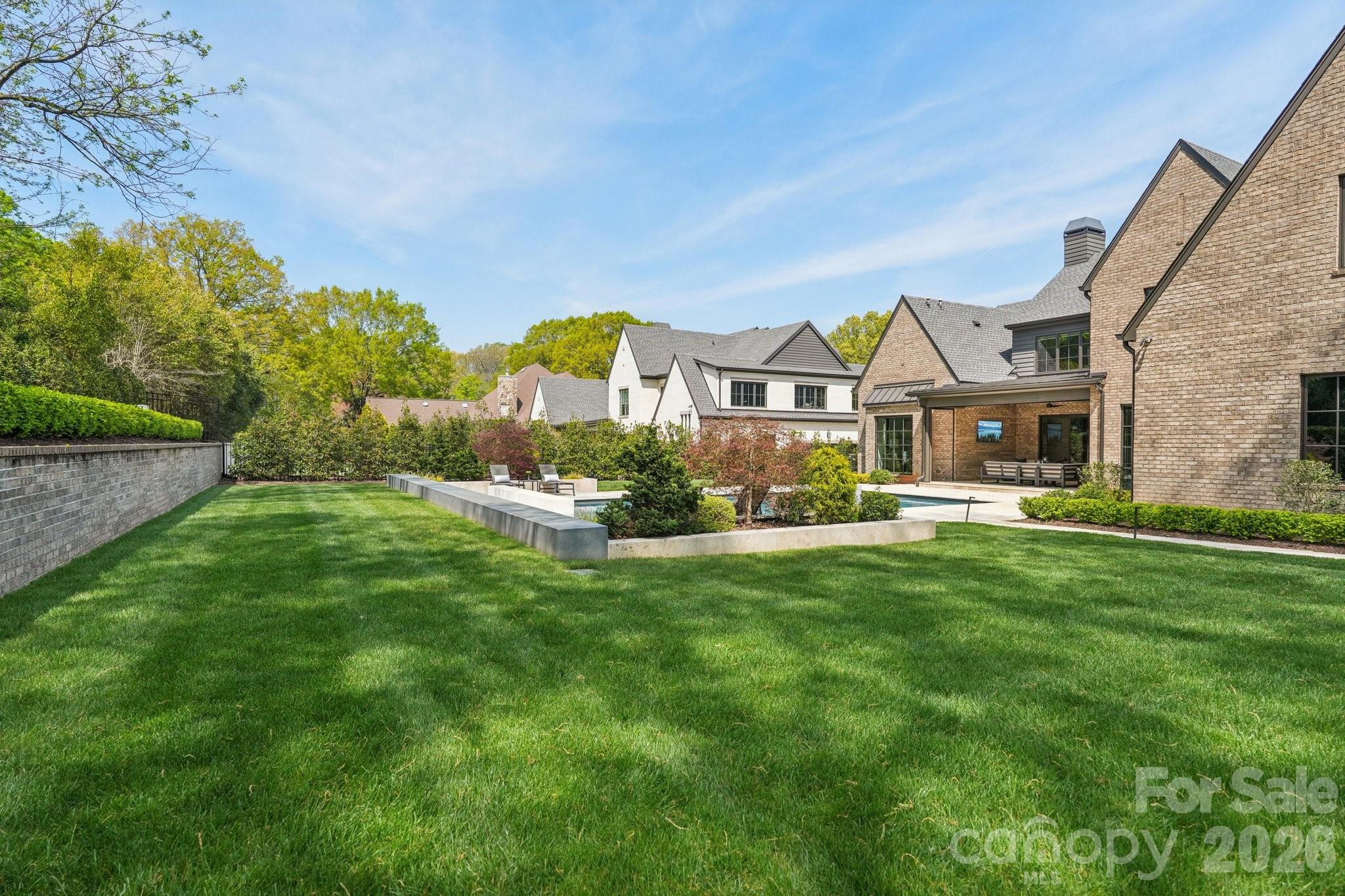 2103 Cortelyou Road Charlotte, NC 28211 - Photo 38 of 45 a front view of a house with a yard