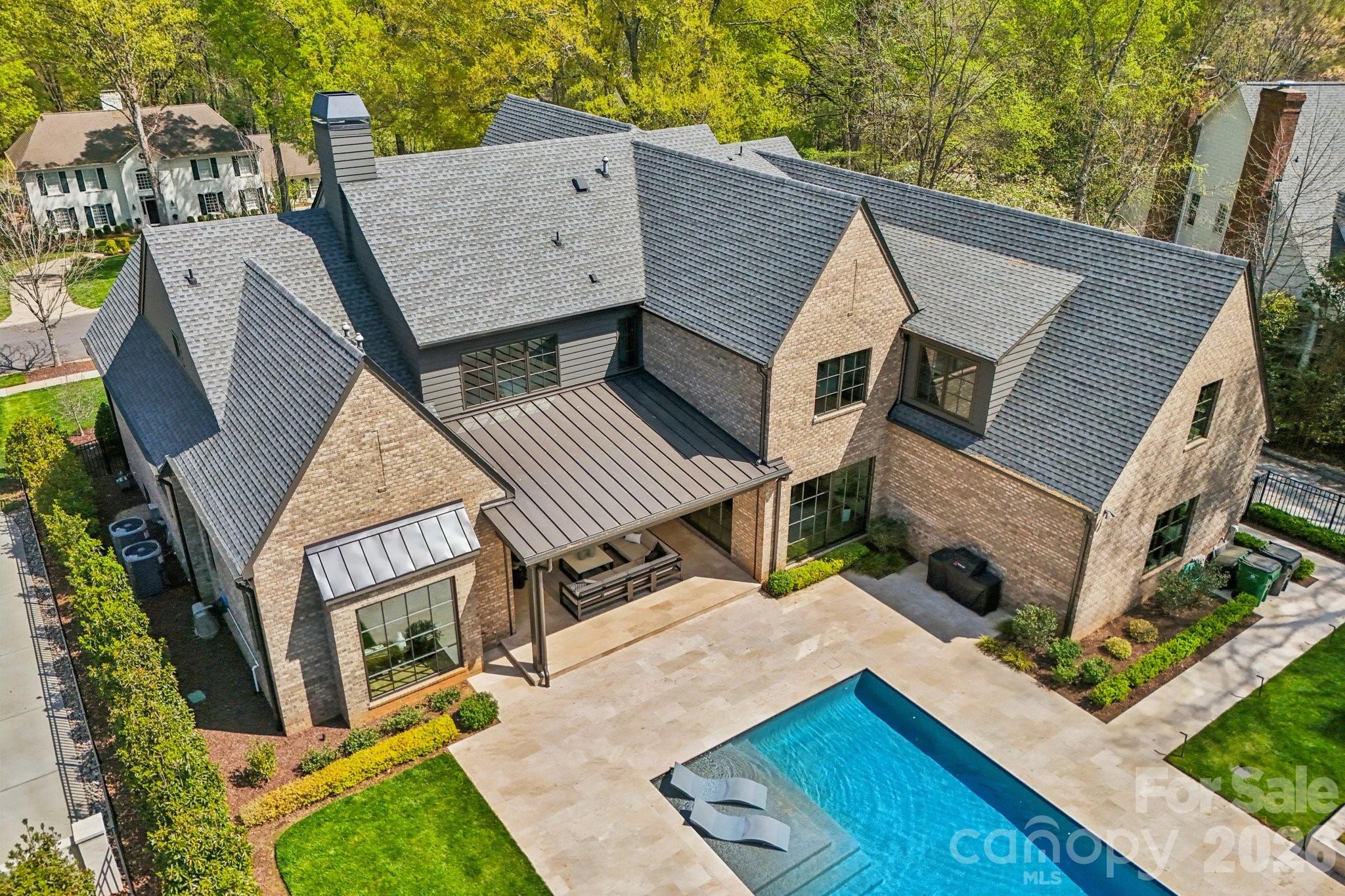 2103 Cortelyou Road Charlotte, NC 28211 - Photo 41 of 45 a view of house with backyard and seating area