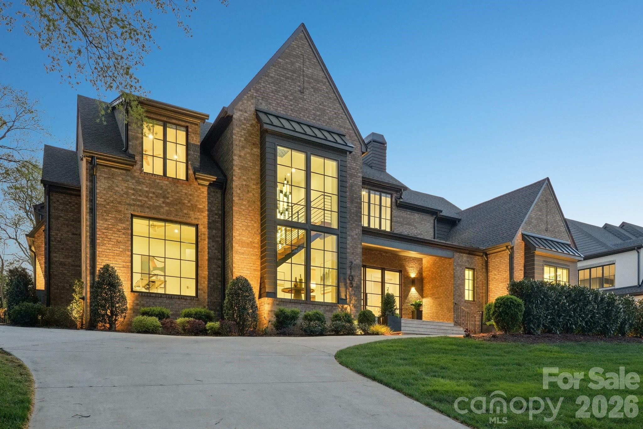 2103 Cortelyou Road Charlotte, NC 28211 - Photo 42 of 45 a front view of a house with a yard