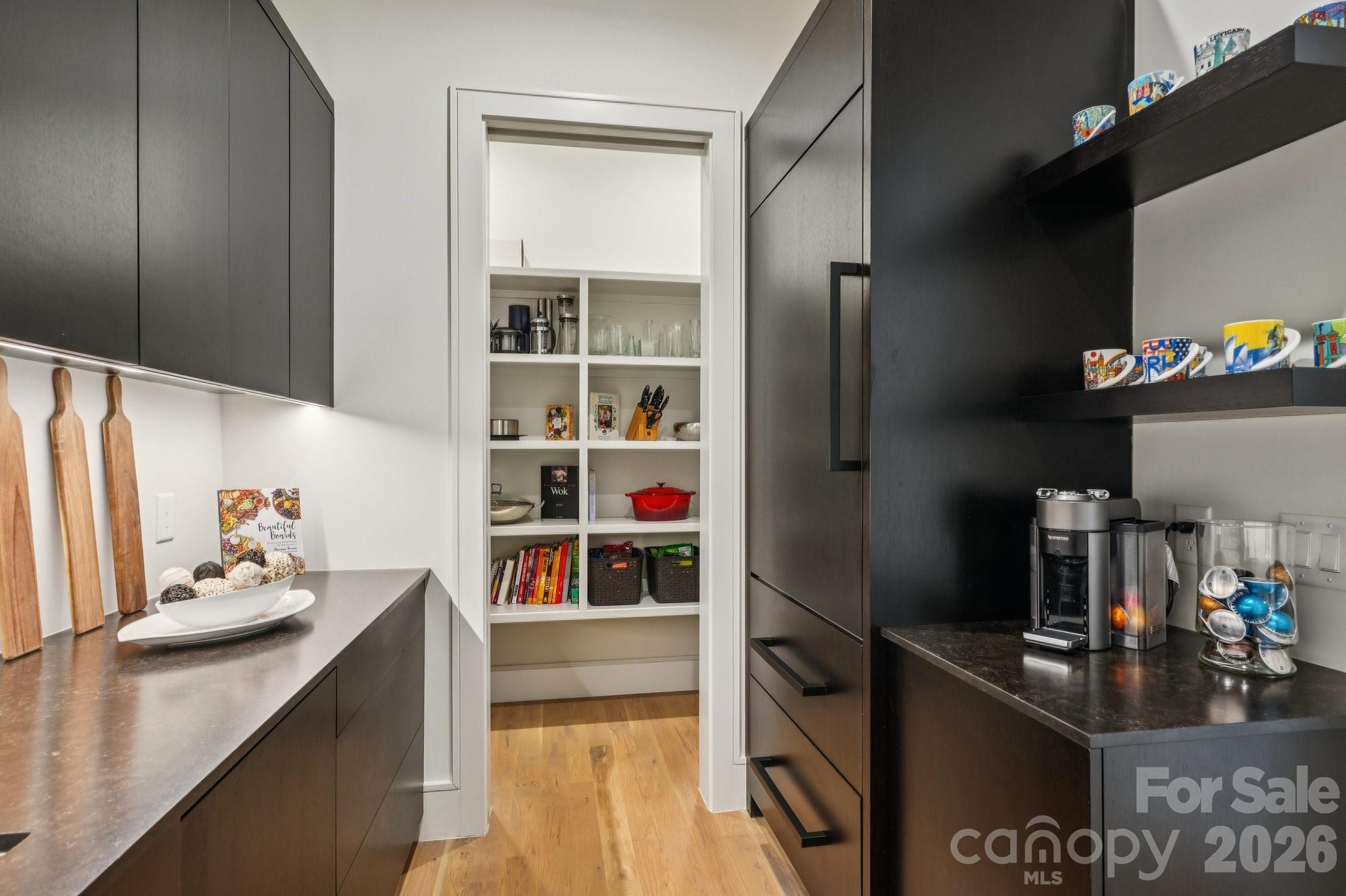 2103 Cortelyou Road Charlotte, NC 28211 - Photo 8 of 45 a kitchen with refrigerator and cabinets