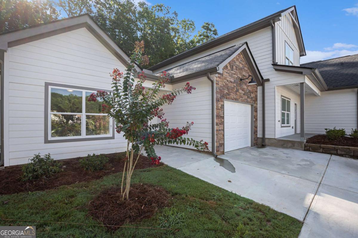 138 Crest Pointe Bremen, GA 30110 - Photo 2 of 24 a view of a house with backyard and garden