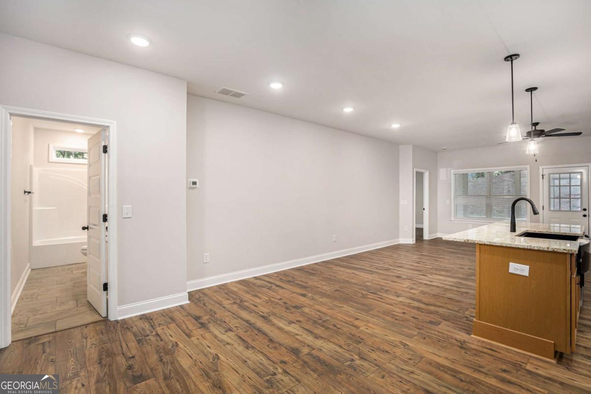138 Crest Pointe Bremen, GA 30110 - Photo 7 of 24 a view of a kitchen with a sink and cabinets
