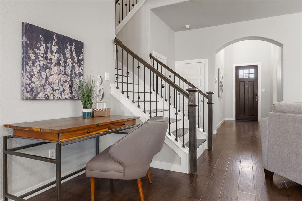 1908 Quail Lane Argyle, TX 76226 - Photo 7 of 30 a living room with furniture and wooden floor