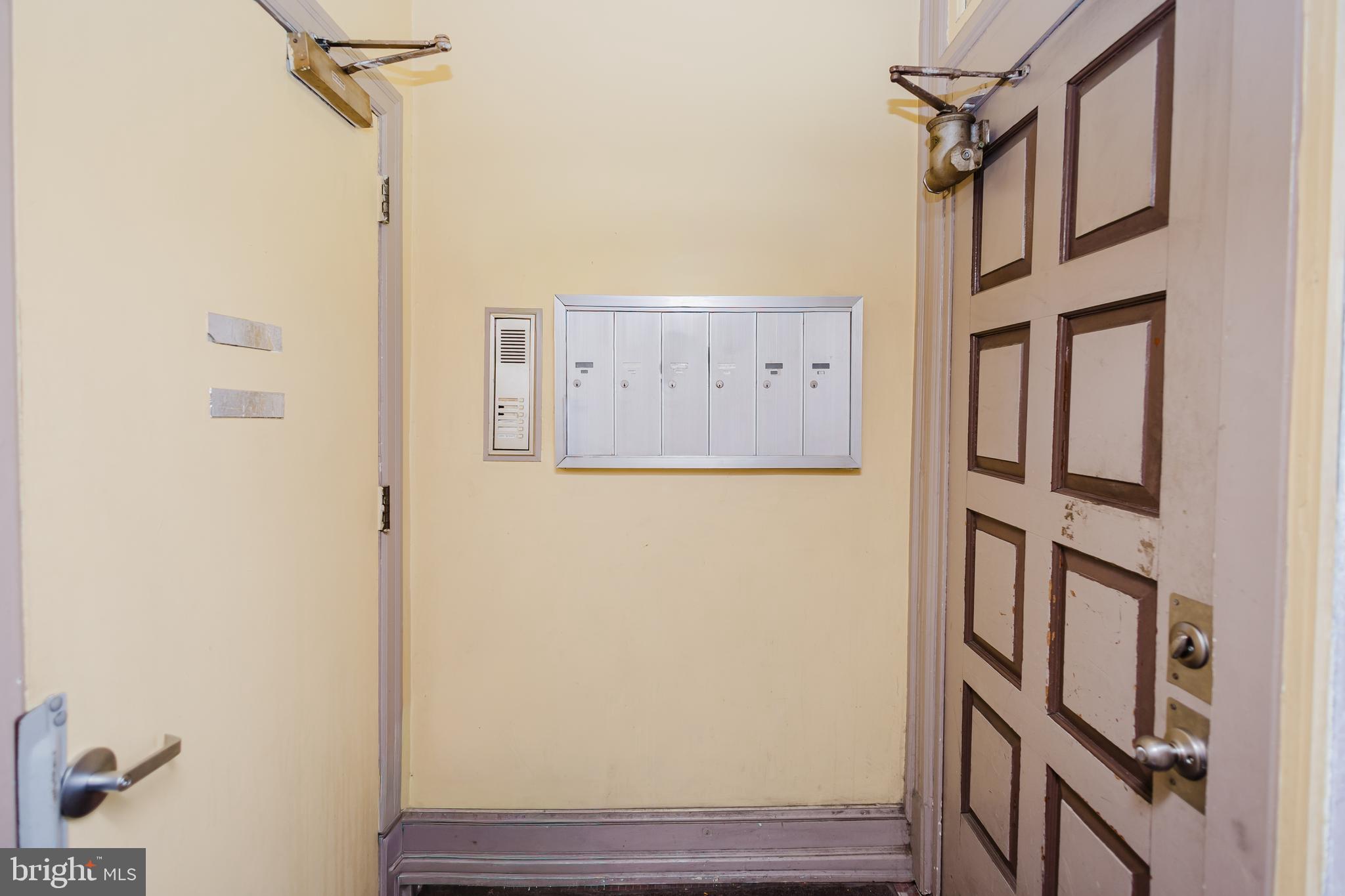 2318 South Broad Street Philadelphia, PA 19145 - Photo 18 of 28 a view of an entryway with wooden floor