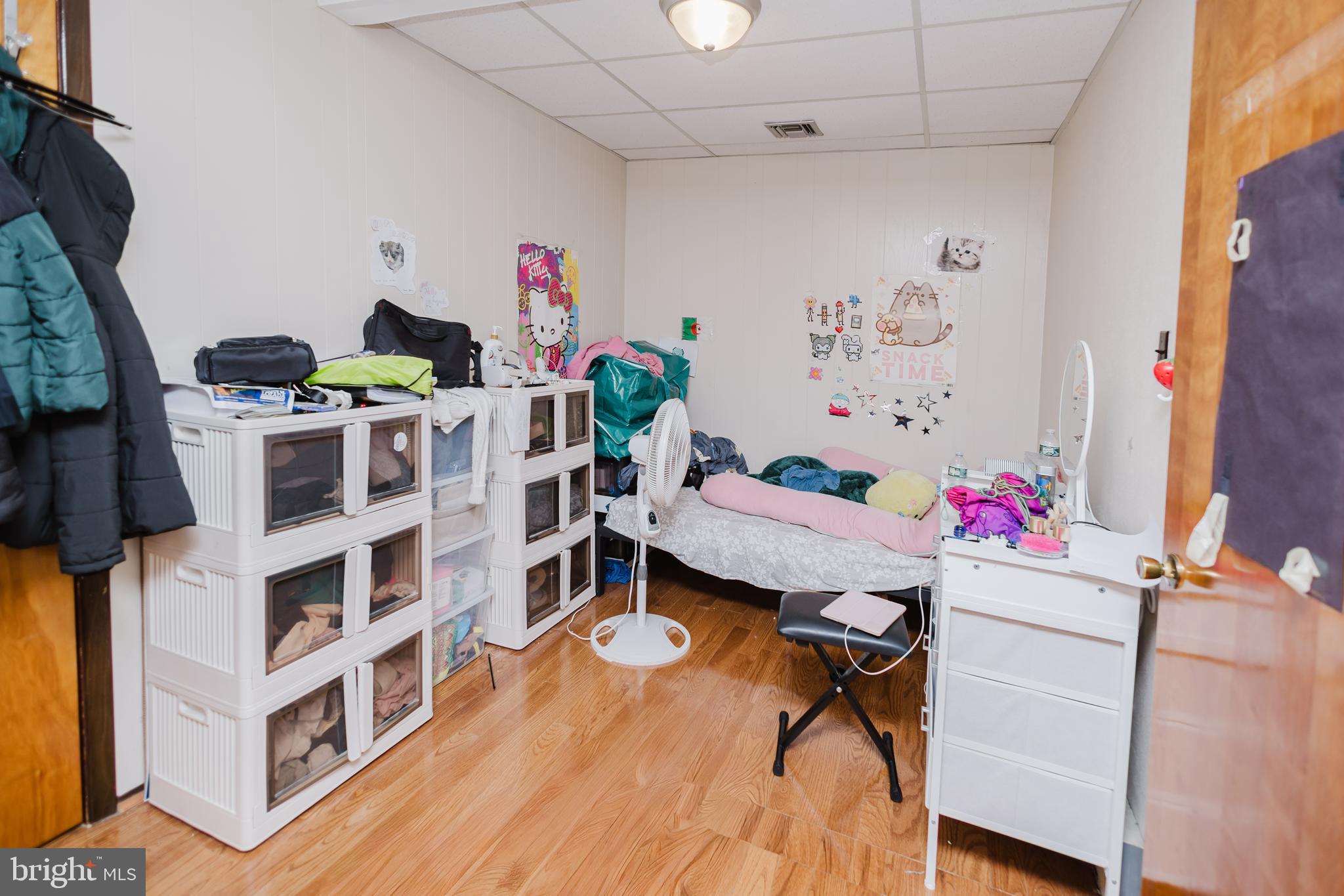 2318 South Broad Street Philadelphia, PA 19145 - Photo 6 of 28 a room with furniture and a flat screen tv
