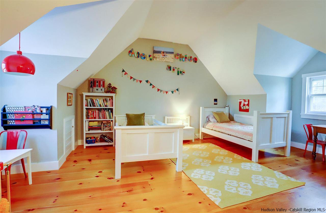 306 Thielman Road Hudson, NY 12534 - Photo 14 of 35 a living room with furniture and a table