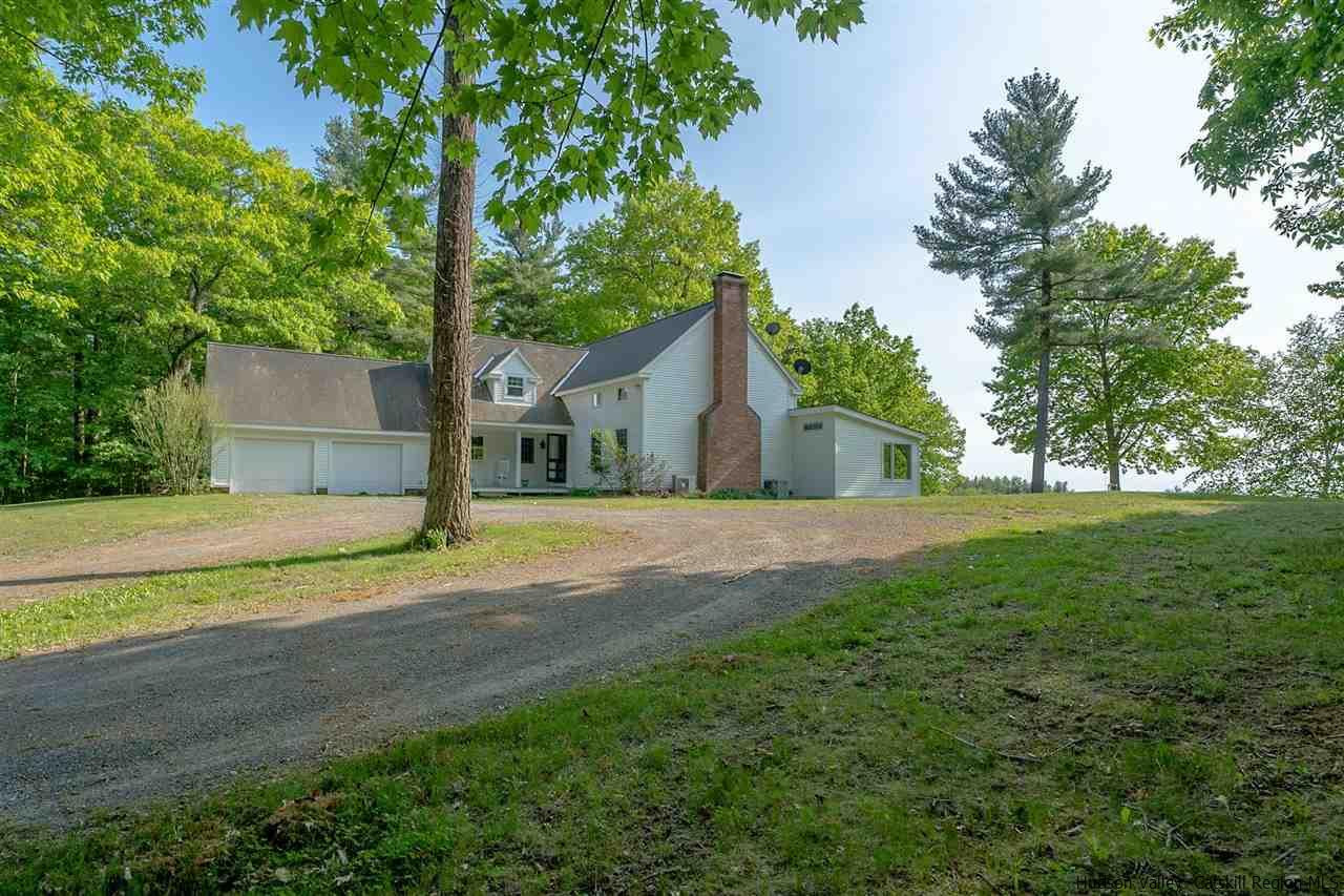 306 Thielman Road Hudson, NY 12534 - Photo 2 of 35 a view of big house with a big yard and large trees