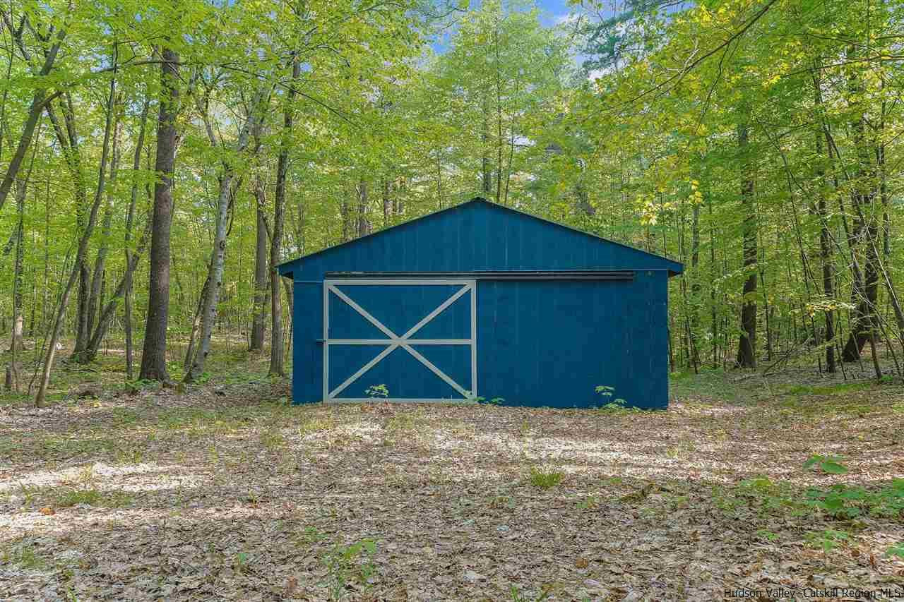 306 Thielman Road Hudson, NY 12534 - Photo 32 of 35 a front view of a house with a yard