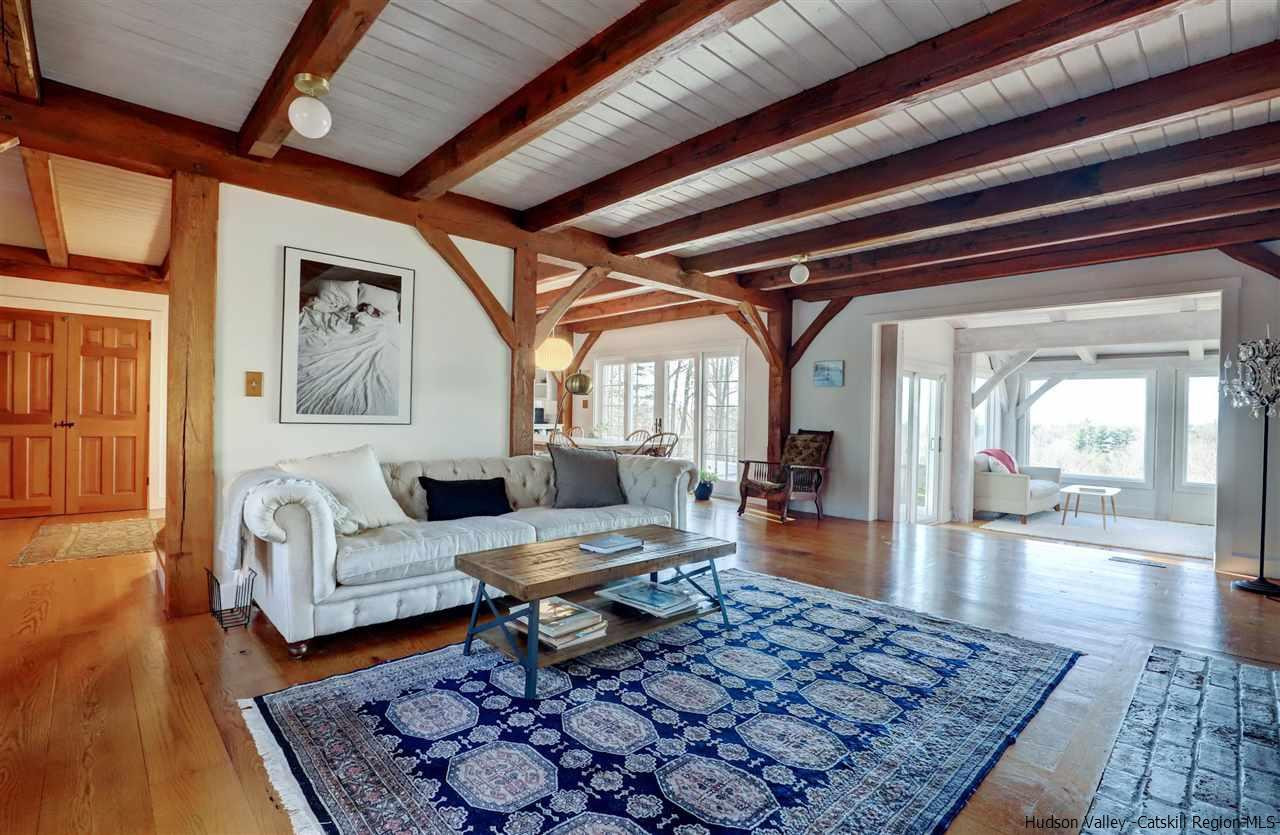 306 Thielman Road Hudson, NY 12534 - Photo 8 of 35 a living room with furniture and wooden floor