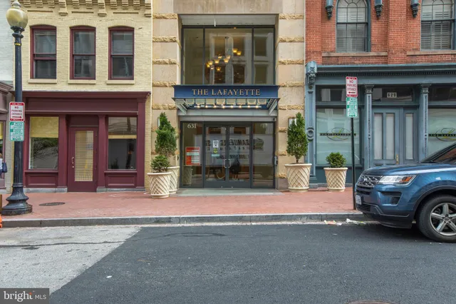 a car parked in front of a building