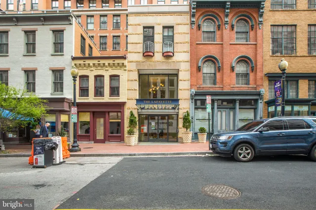 a car parked in front of a building