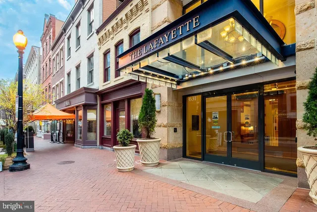 a view of a building with sitting area