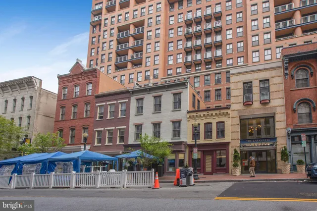 a front view of a building with street view