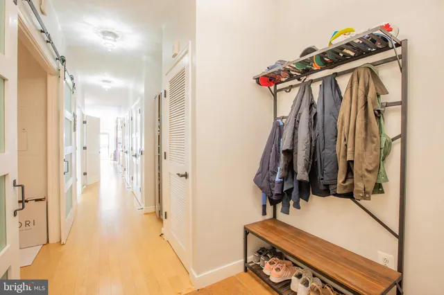 a view of a hallway with staircase