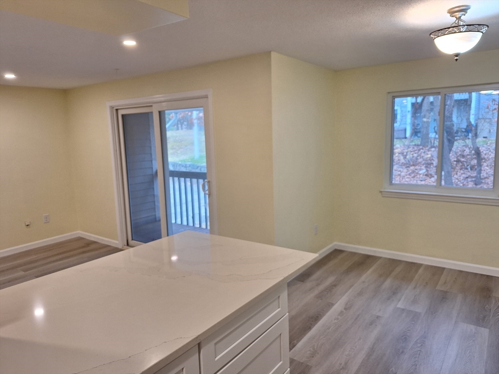 10 Beal's Cove Road, Unit C Hingham, MA 02043 - Photo 8 of 10 a view of an empty room with a window