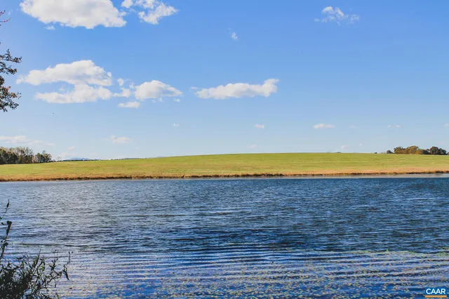 a view of an ocean and a yard