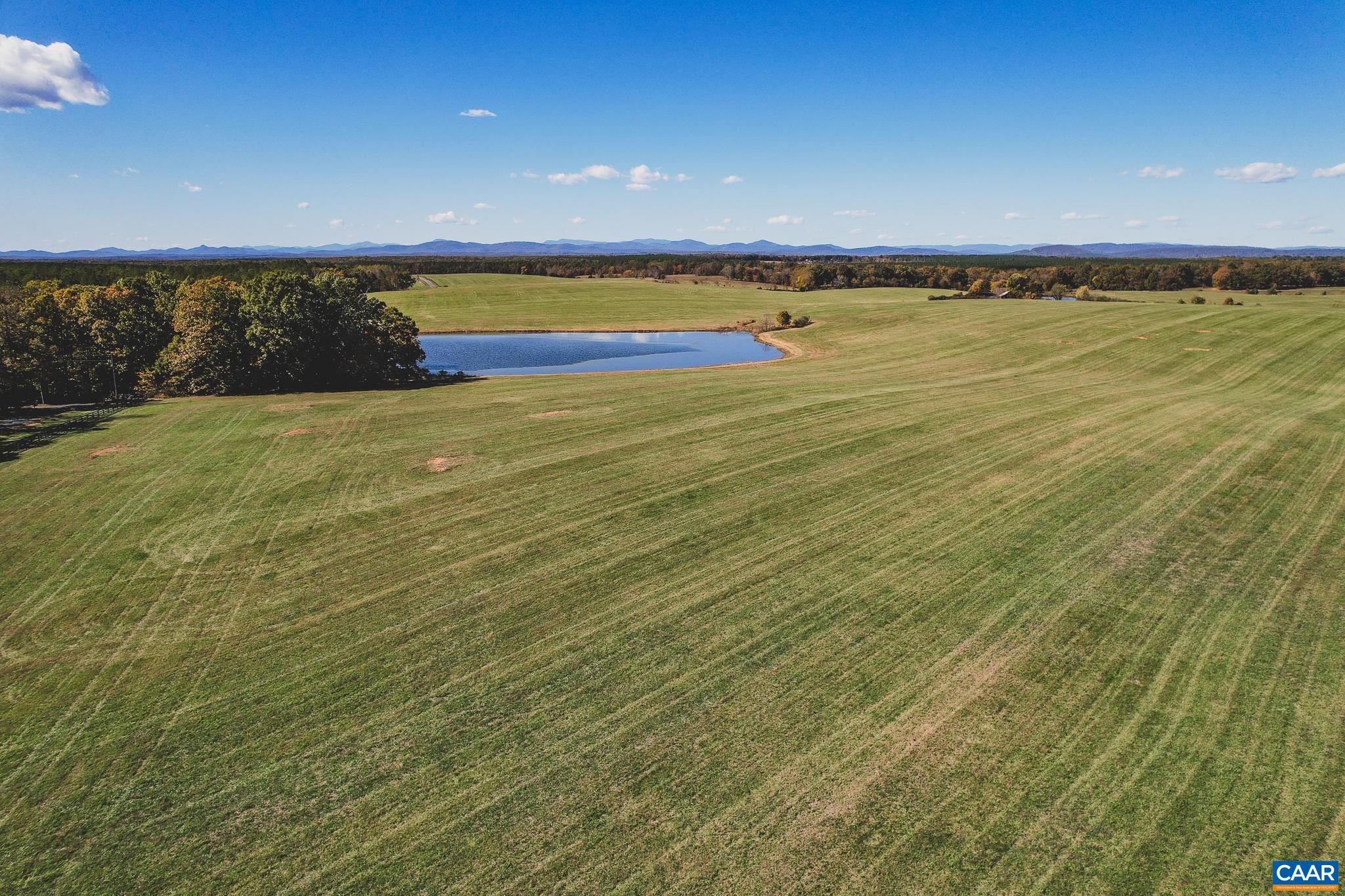 Lot 17 Rolling Road Scottsville, VA 24590 - Photo 4 of 27 a view of an ocean and beach