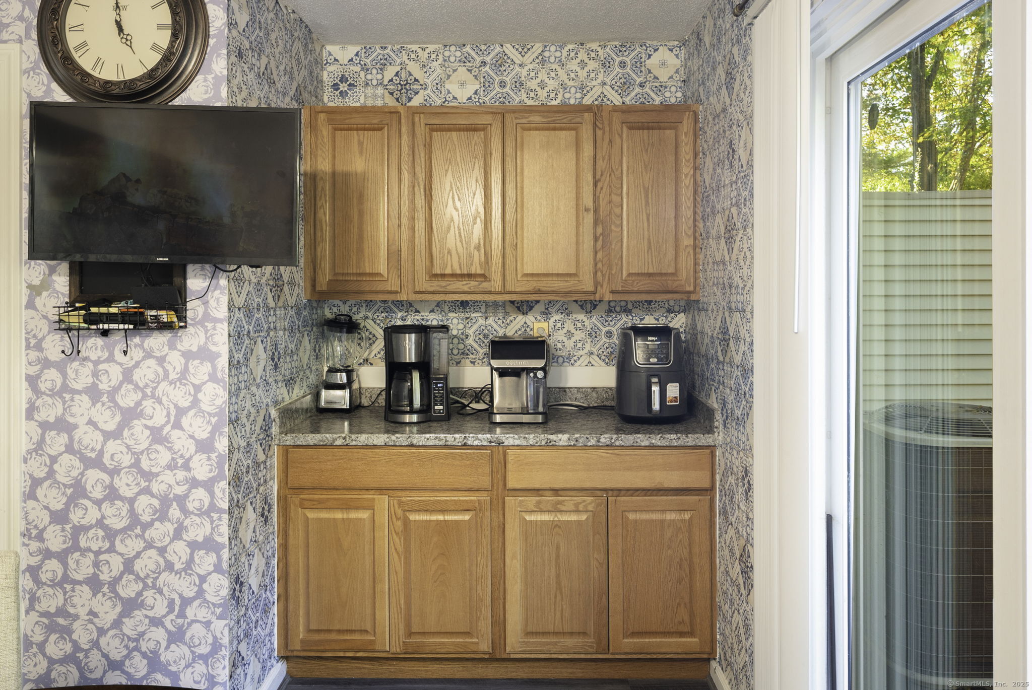 380 Hitchcock Road, Unit 48 Waterbury, CT 06705 - Photo 28 of 28 a kitchen with a sink a stove and a microwave