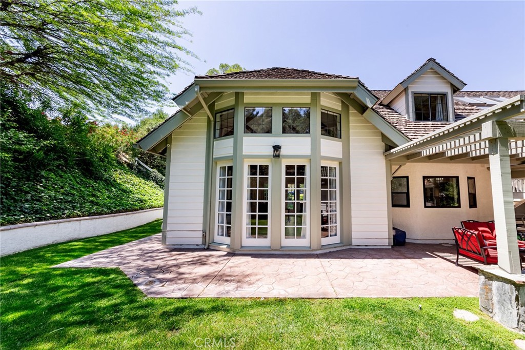 15601 Saddleback Road Canyon Country, CA 91387 - Photo 40 of 55 a front view of a house with a garden