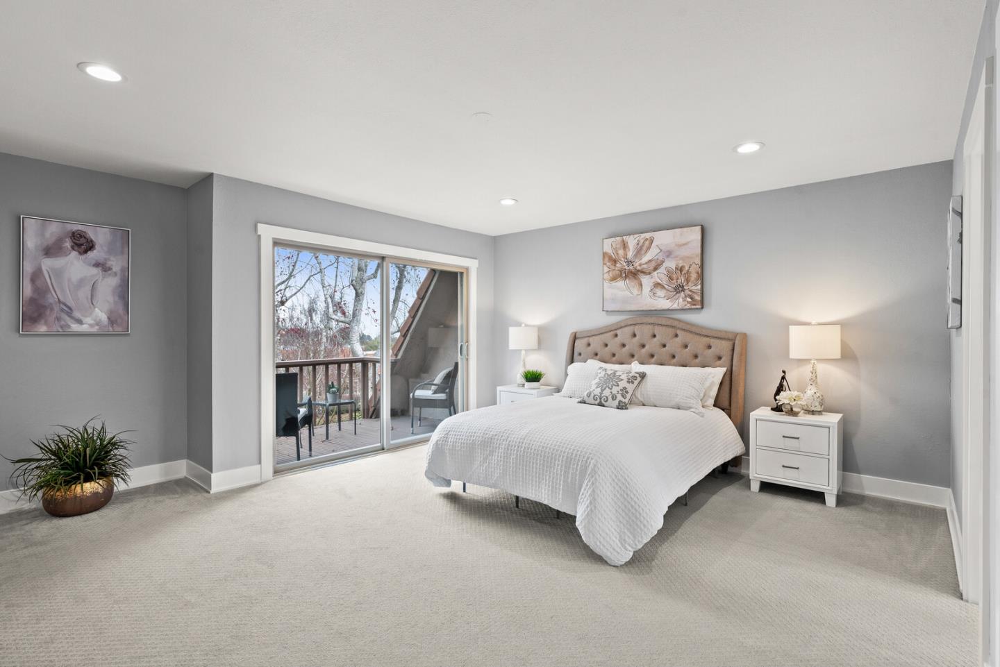 5 Rinconada Circle Belmont, CA 94002 - Photo 11 of 24 a spacious bedroom with a bed and a large window