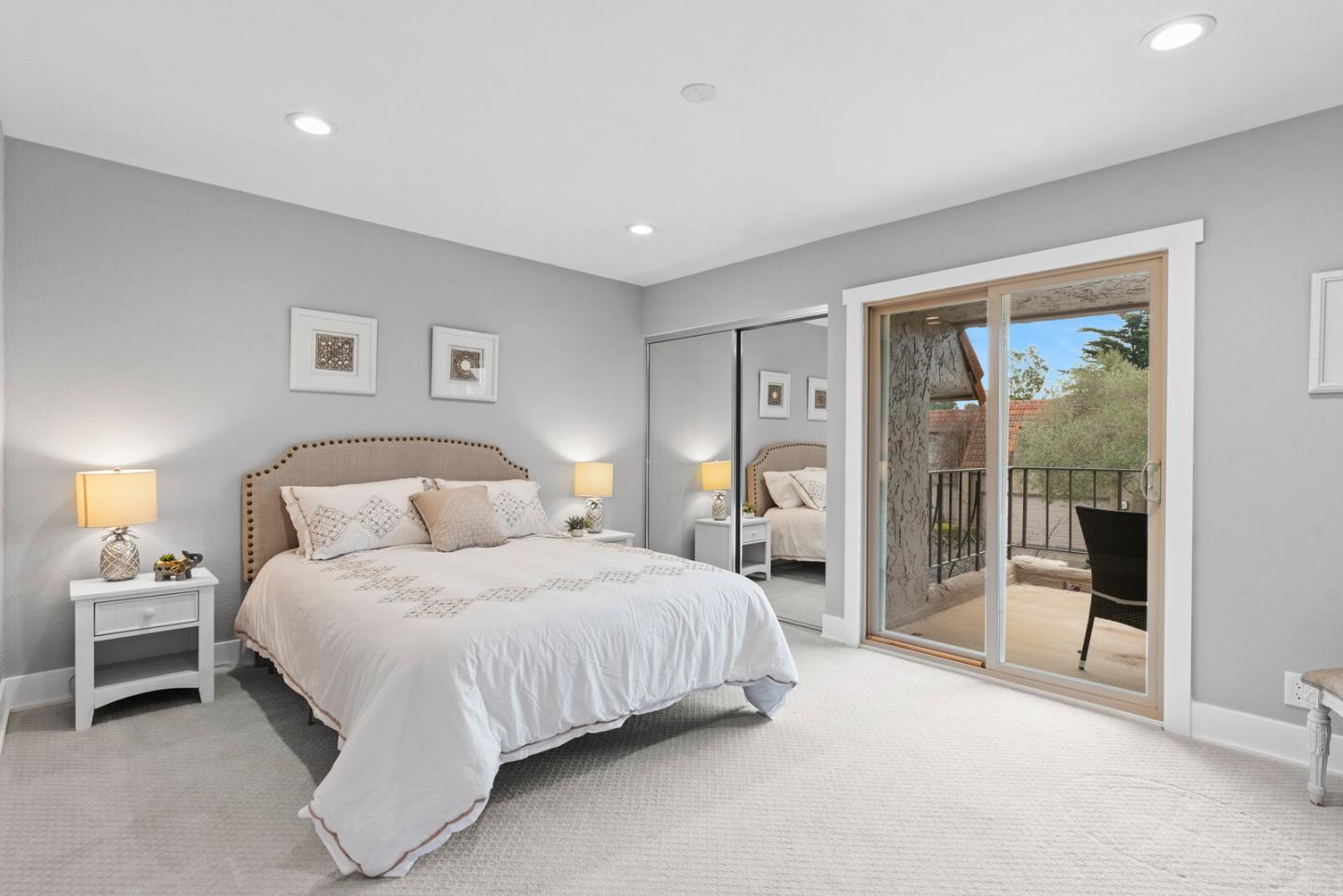 5 Rinconada Circle Belmont, CA 94002 - Photo 14 of 24 a bedroom with a bed and a lamp