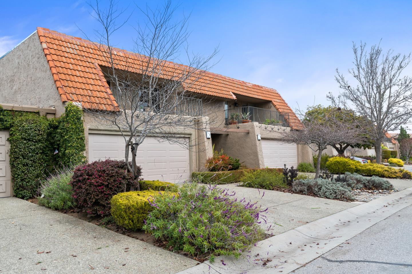 5 Rinconada Circle Belmont, CA 94002 - Photo 18 of 24 a front view of a house with a yard