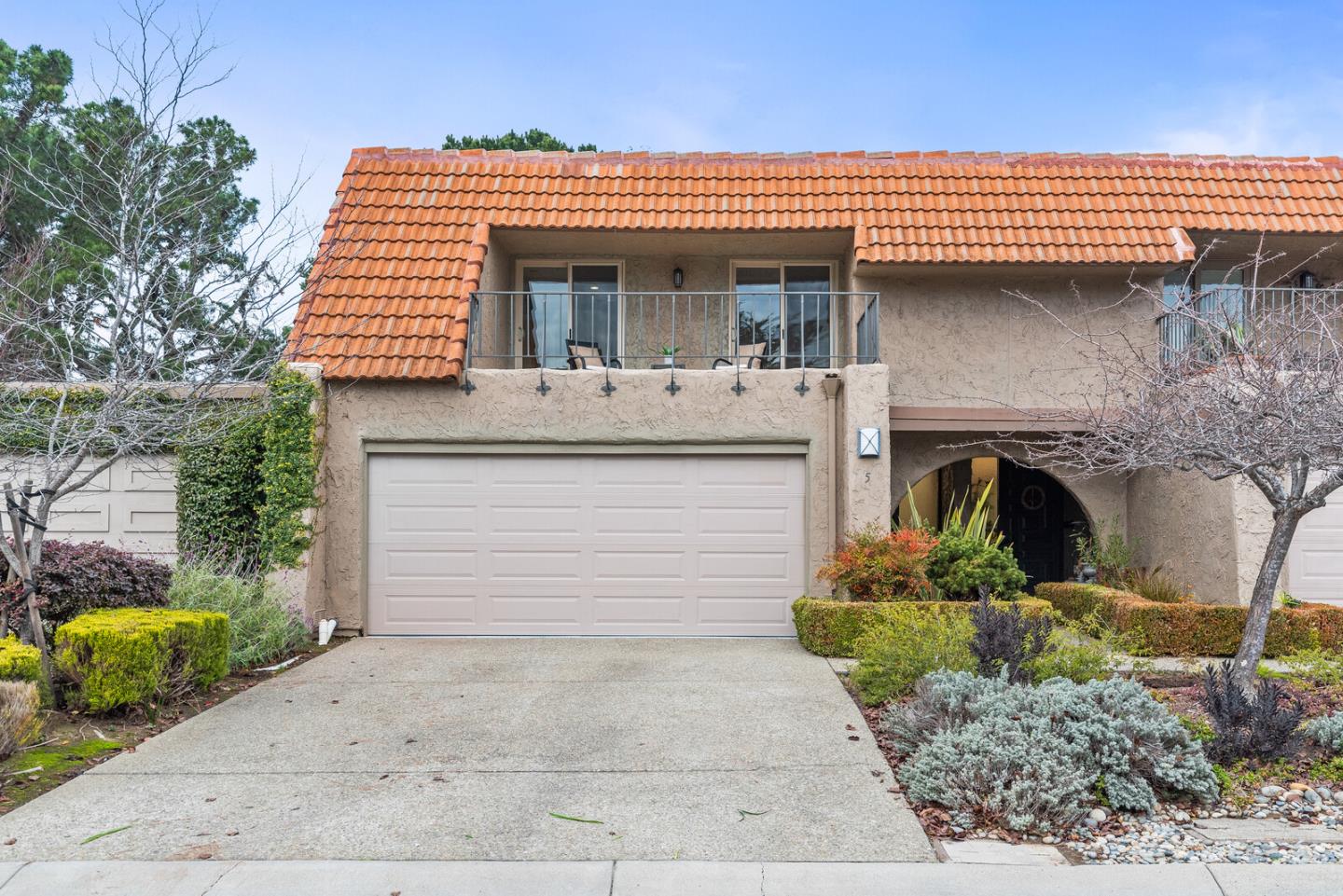 5 Rinconada Circle Belmont, CA 94002 - Photo 19 of 24 a view of a house with large windows