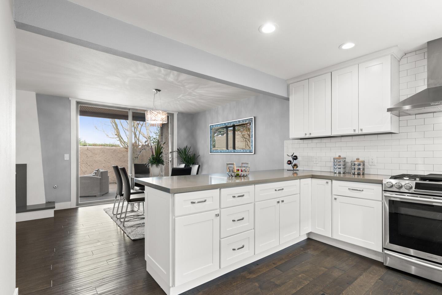 5 Rinconada Circle Belmont, CA 94002 - Photo 6 of 24 a kitchen with a sink stove and cabinets