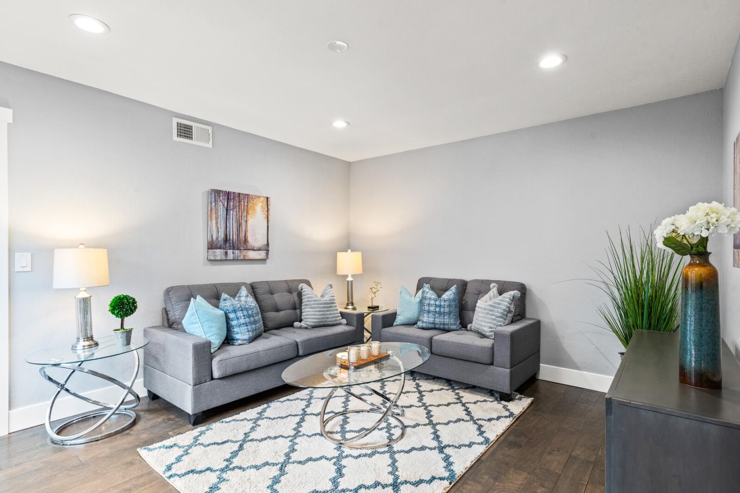 5 Rinconada Circle Belmont, CA 94002 - Photo 9 of 24 a living room with furniture and a potted plant