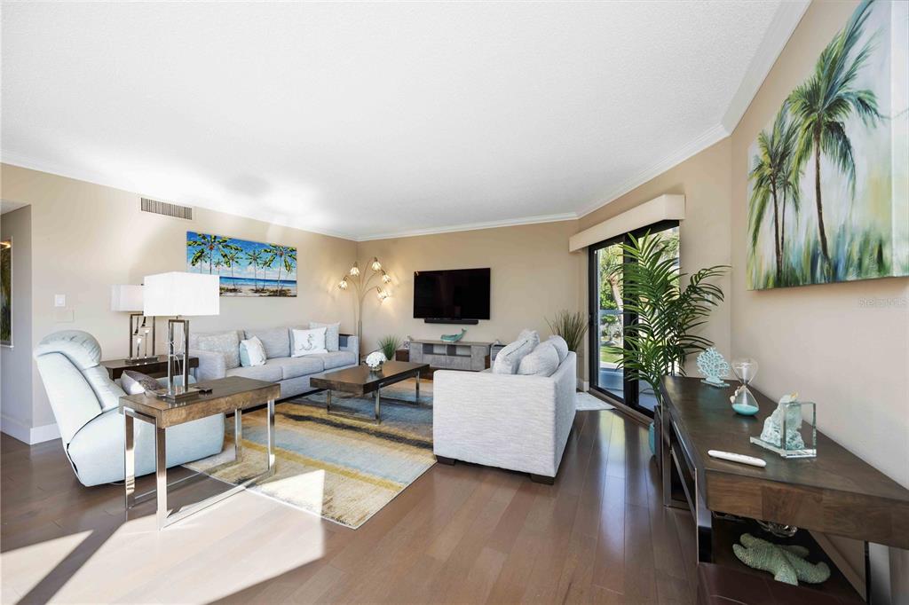 1050 Longboat Club Road, Unit 204 Longboat Key, FL 34228 - Photo 14 of 64 a living room with furniture