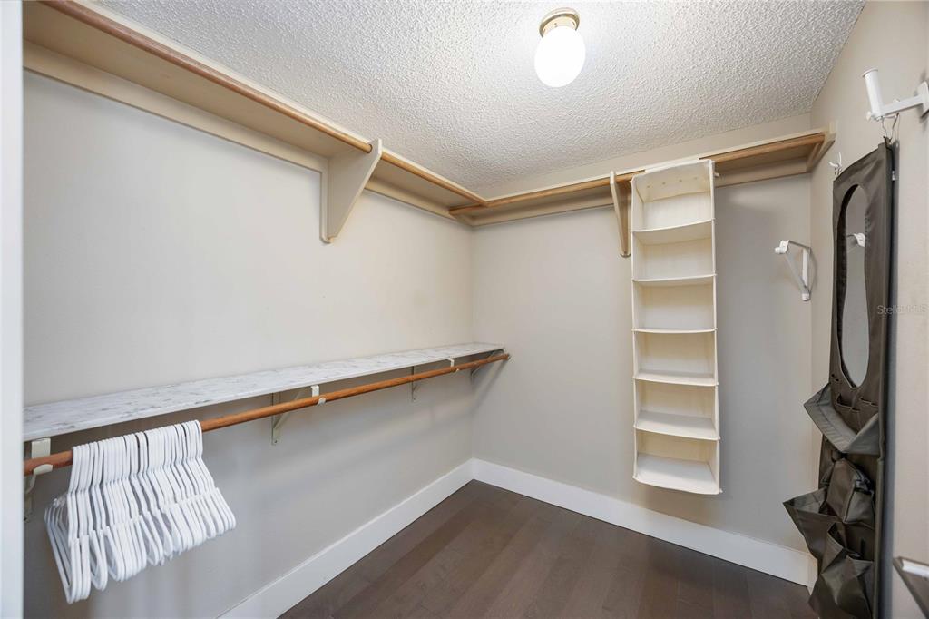 1050 Longboat Club Road, Unit 204 Longboat Key, FL 34228 - Photo 29 of 64 a view of an empty walk in closet