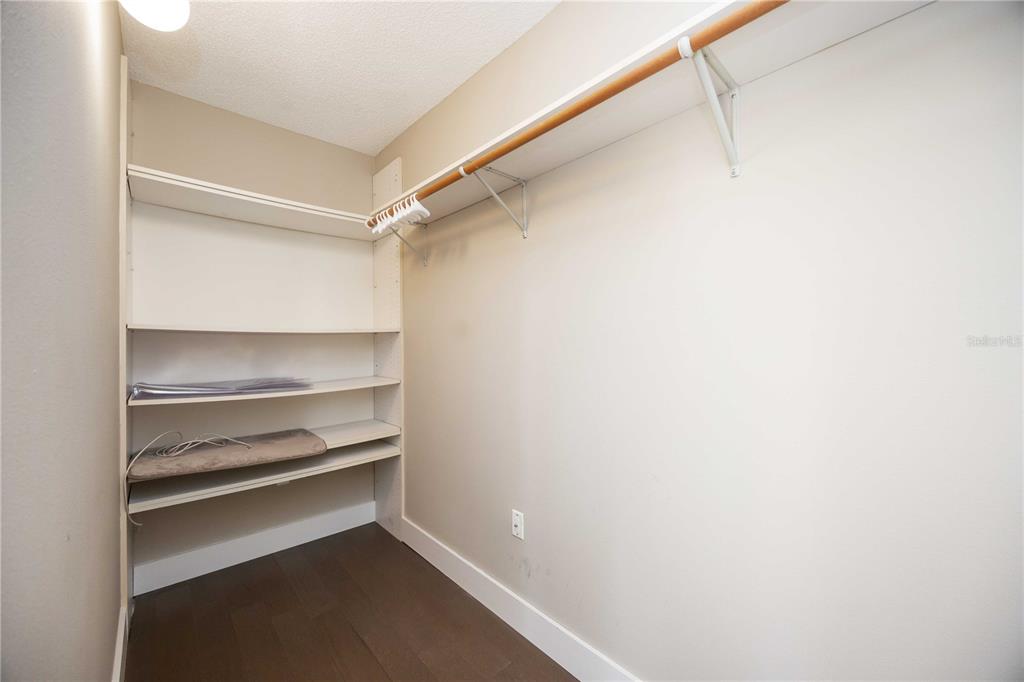 1050 Longboat Club Road, Unit 204 Longboat Key, FL 34228 - Photo 36 of 64 a view of an empty walk in closet