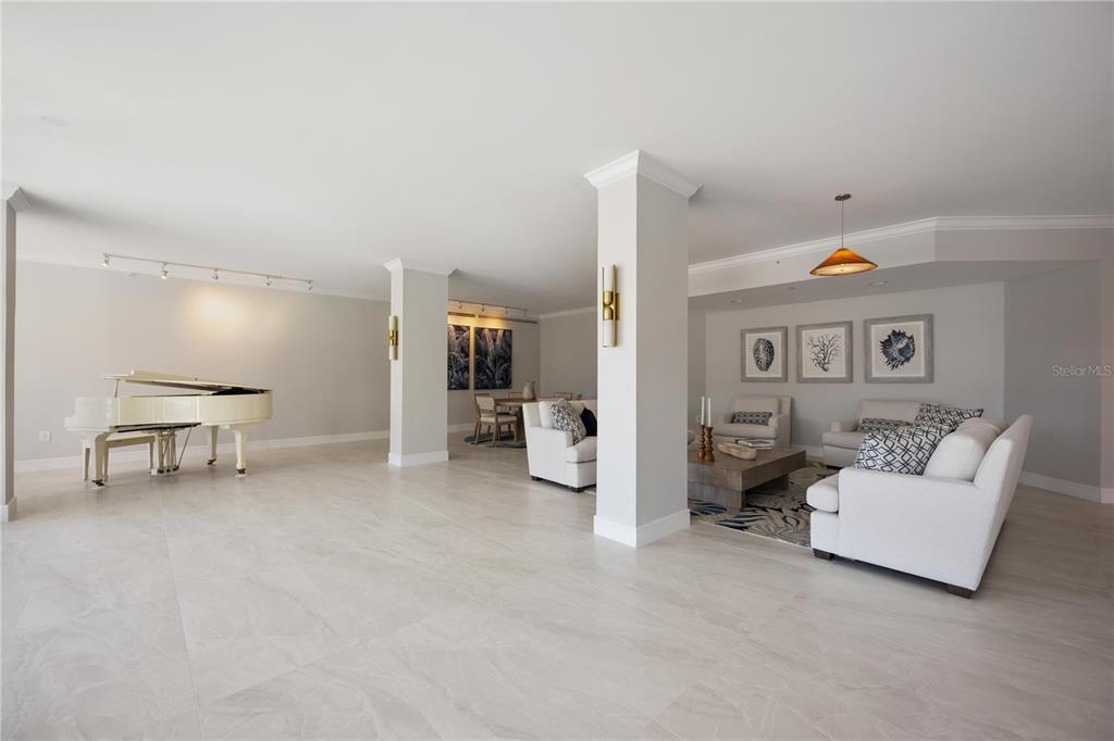 1050 Longboat Club Road, Unit 204 Longboat Key, FL 34228 - Photo 6 of 64 a view of livingroom with furniture and air hockey table