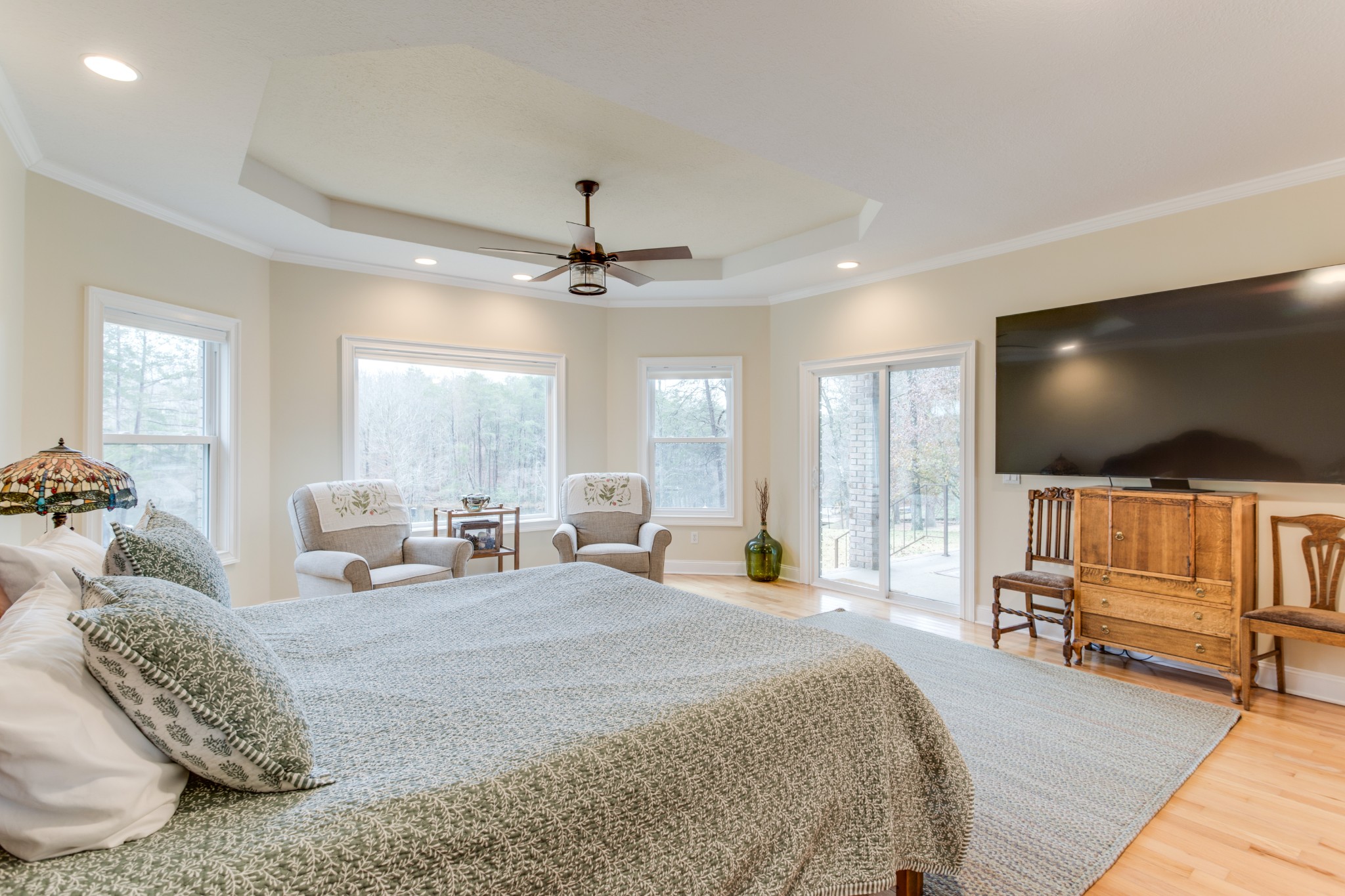374 Eagle Lake Road Coalmont, TN 37313 - Photo 22 of 47 a spacious bedroom with a bed and a flat screen television