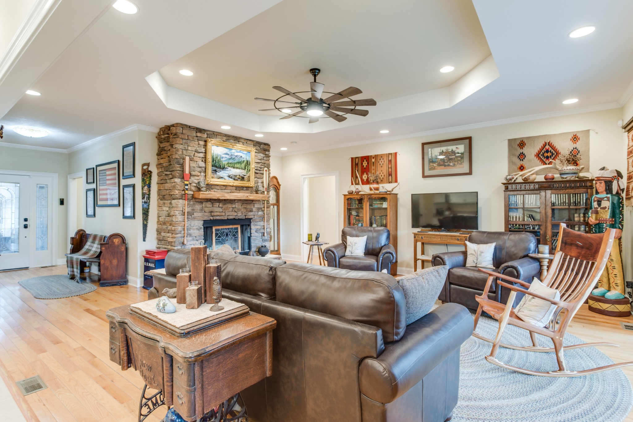374 Eagle Lake Road Coalmont, TN 37313 - Photo 9 of 47 a living room with fireplace furniture and a flat screen tv
