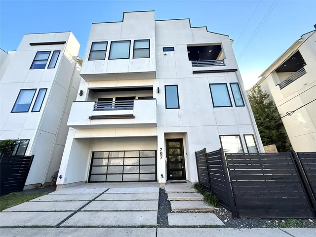 a front view of a house with stairs