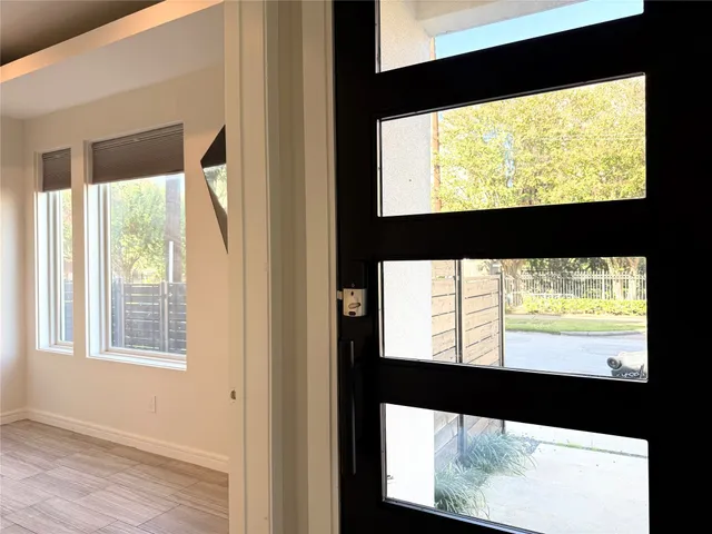 a view of a large window with an outdoor space