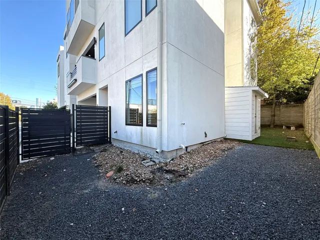 a view of backyard and pathway